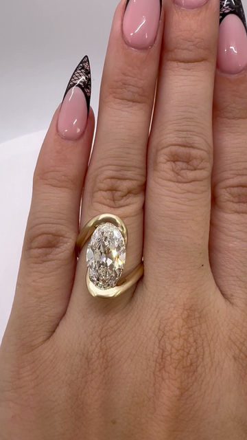 Thumbnail: 5.03 carat E VVS2 antique moval half bezel bypass satin finish lab diamond