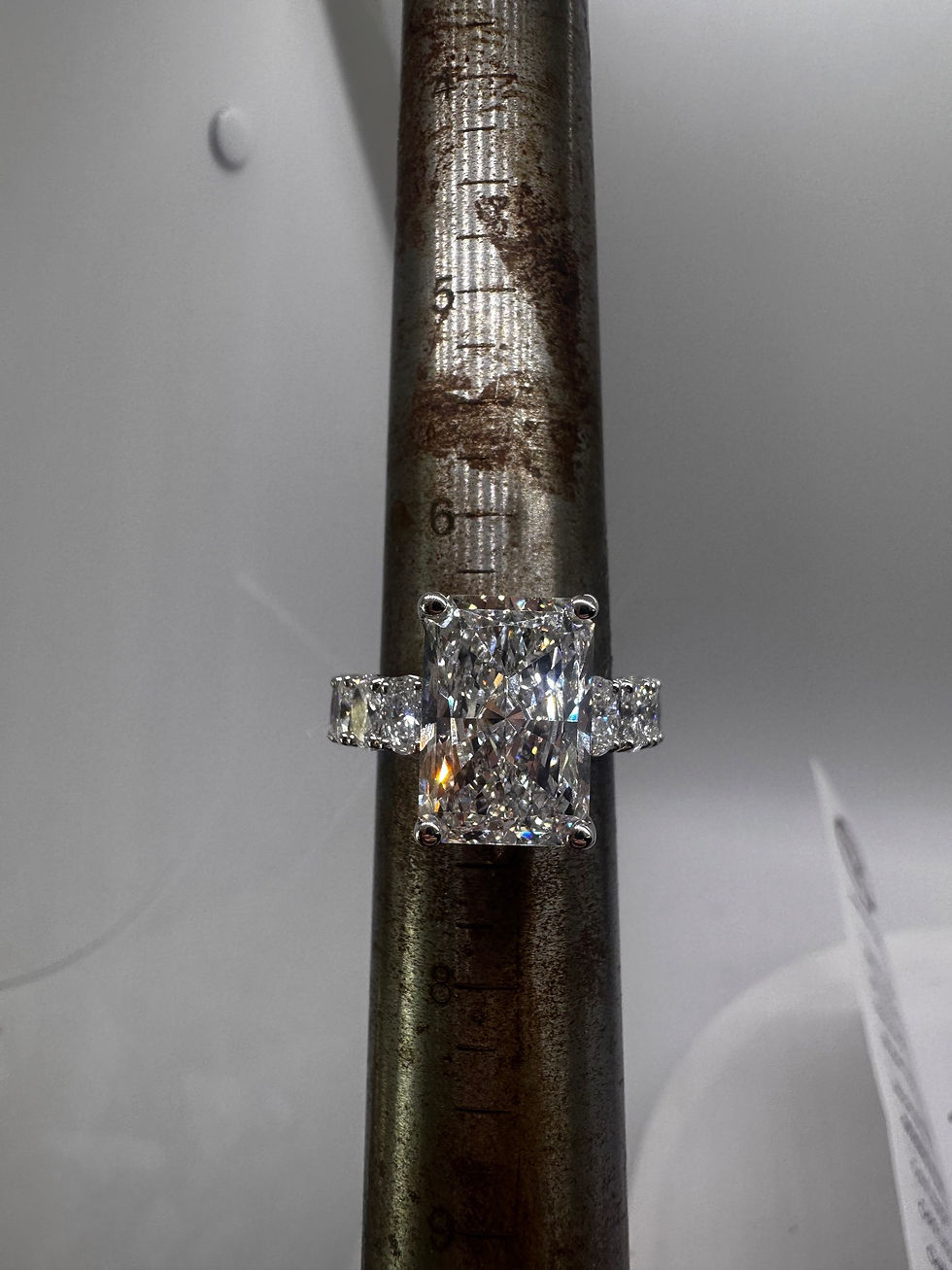 Thumbnail: 7.63 carat F VS2 radiant cut lab diamond with oval diamond band 