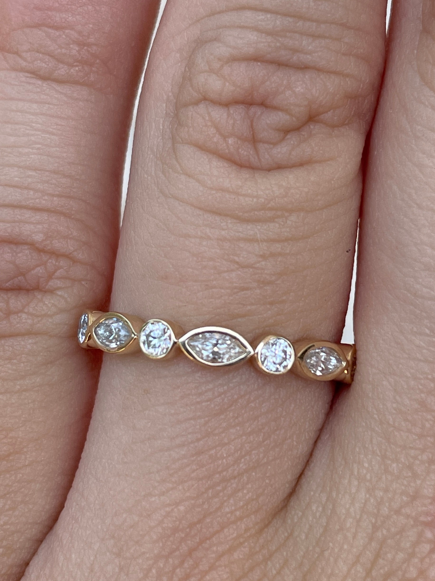 Marquise and round alternating bezel band 14k yellow gold