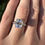 Thumbnail: 3 carat antique emerald cut moissanite with double prongs on 14k white gold