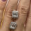 Thumbnail: 2.1 CTW emerald cut earrings with halo 10k white gold 