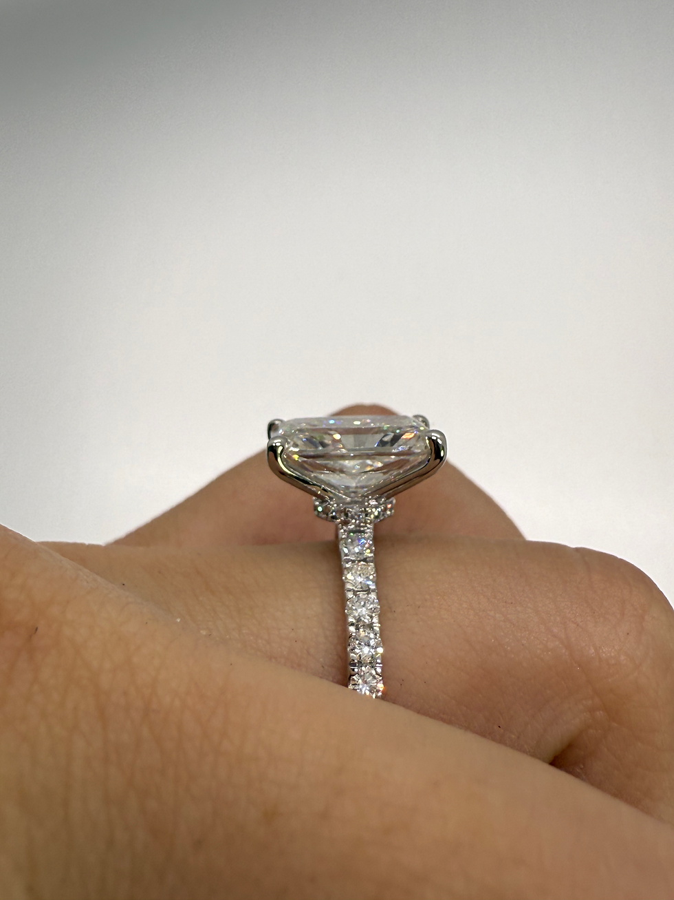 Thumbnail: 4.07 carat G VS2 radiant cut lab diamond on a pave band with hidden halo collar