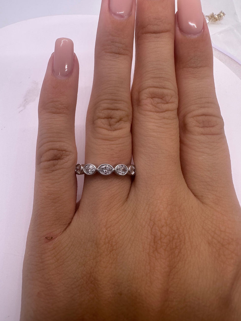 Thumbnail: 1.03 CTW east west oval lab diamond bezel wedding band 