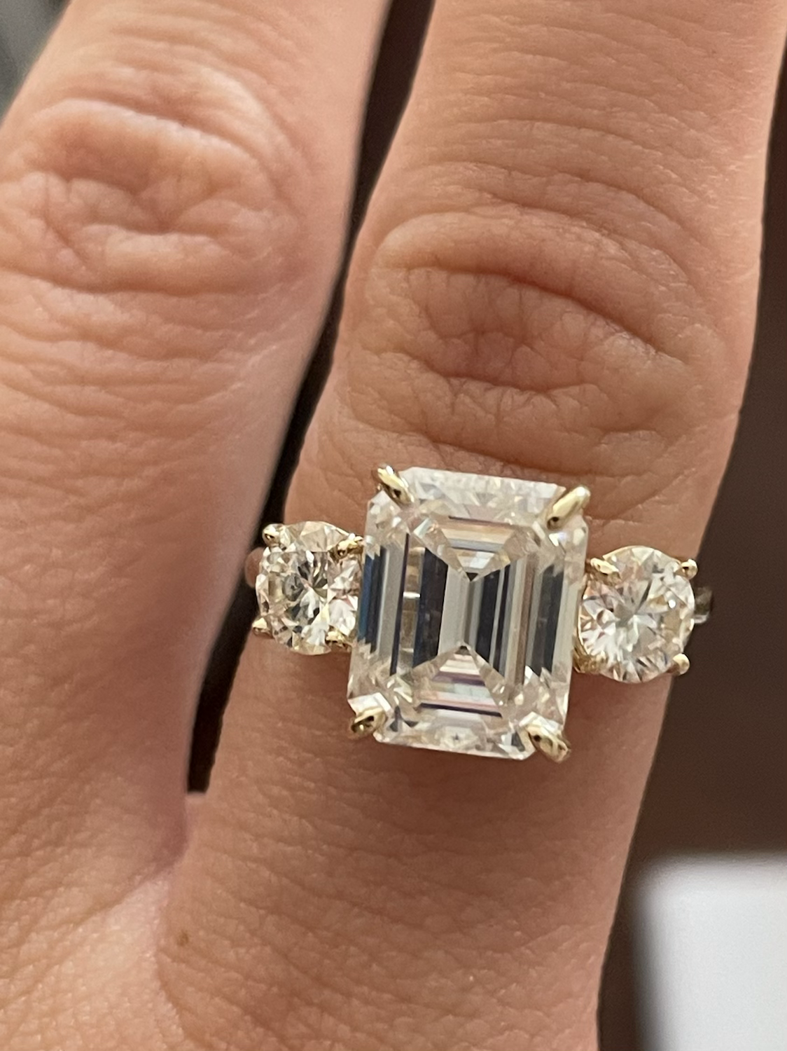4 carat emerald cut 3 stone ring