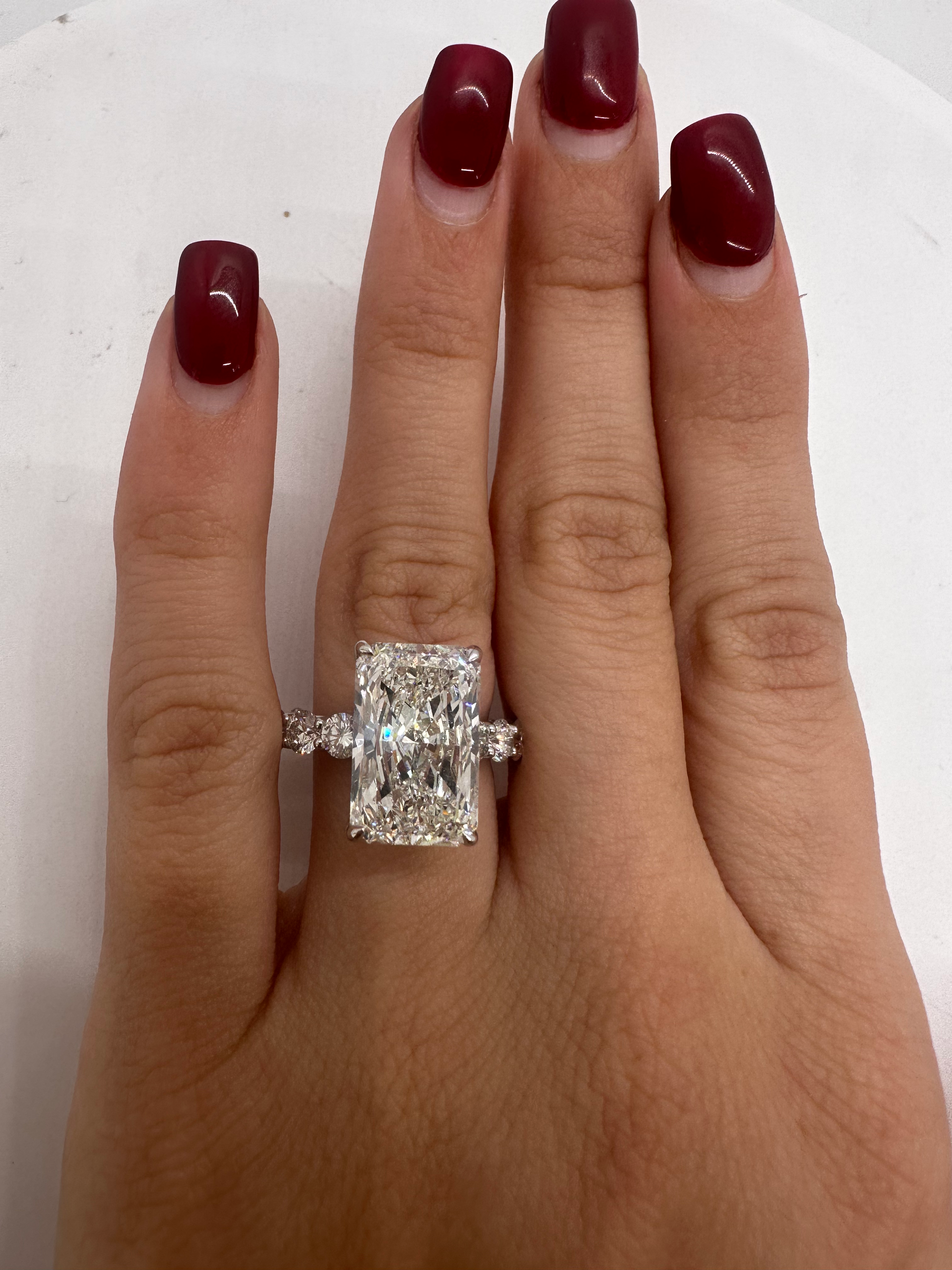 7.24 carat G VS2 radiant cut lab diamond on a 3.5mm round diamond band