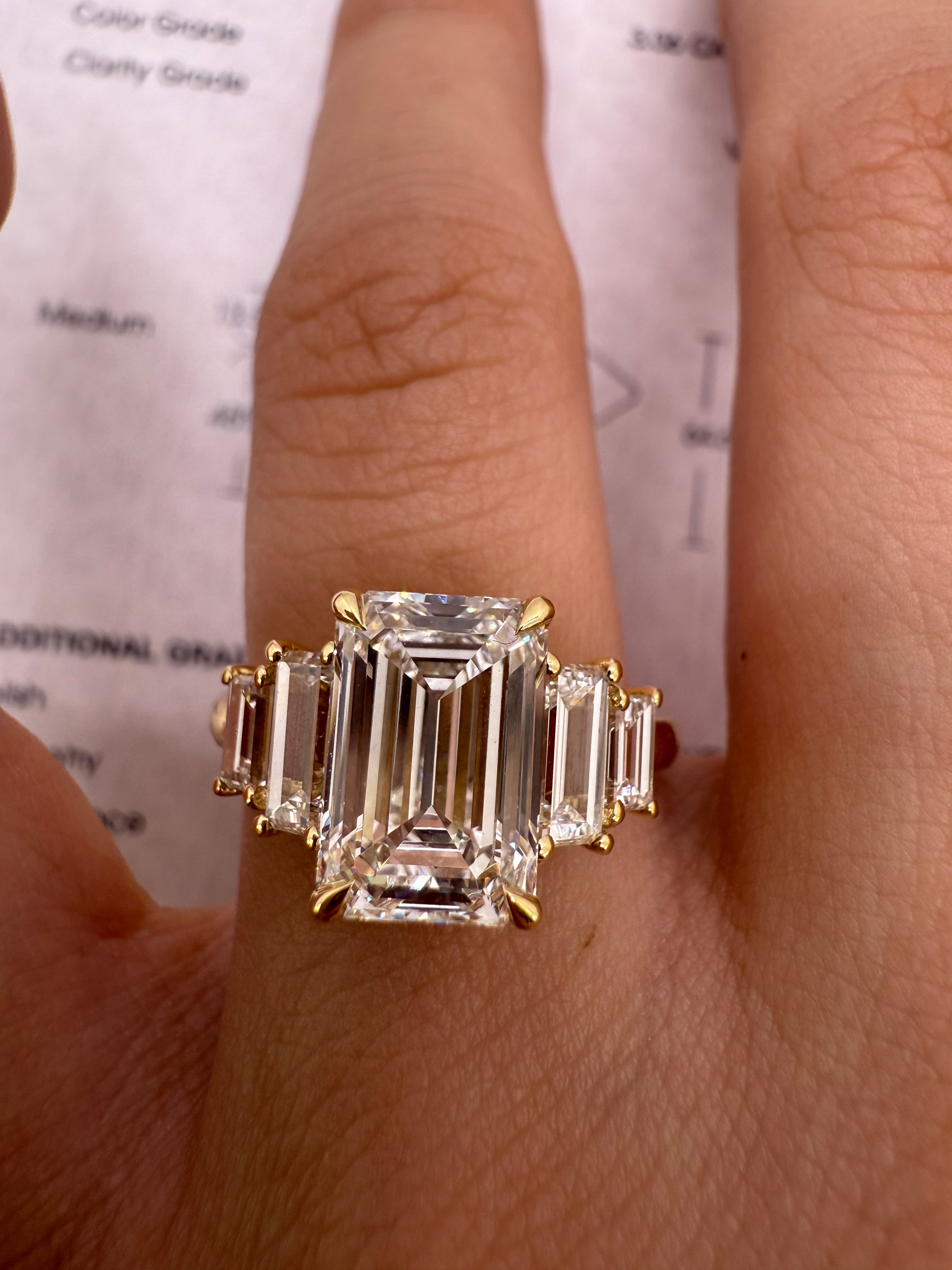 3.06 carat D VS1 emerald cut lab diamond with side baguette diamonds 5 stone