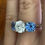 Thumbnail: 3 stone lab grown sapphire and moissanite 14k white gold ring 
