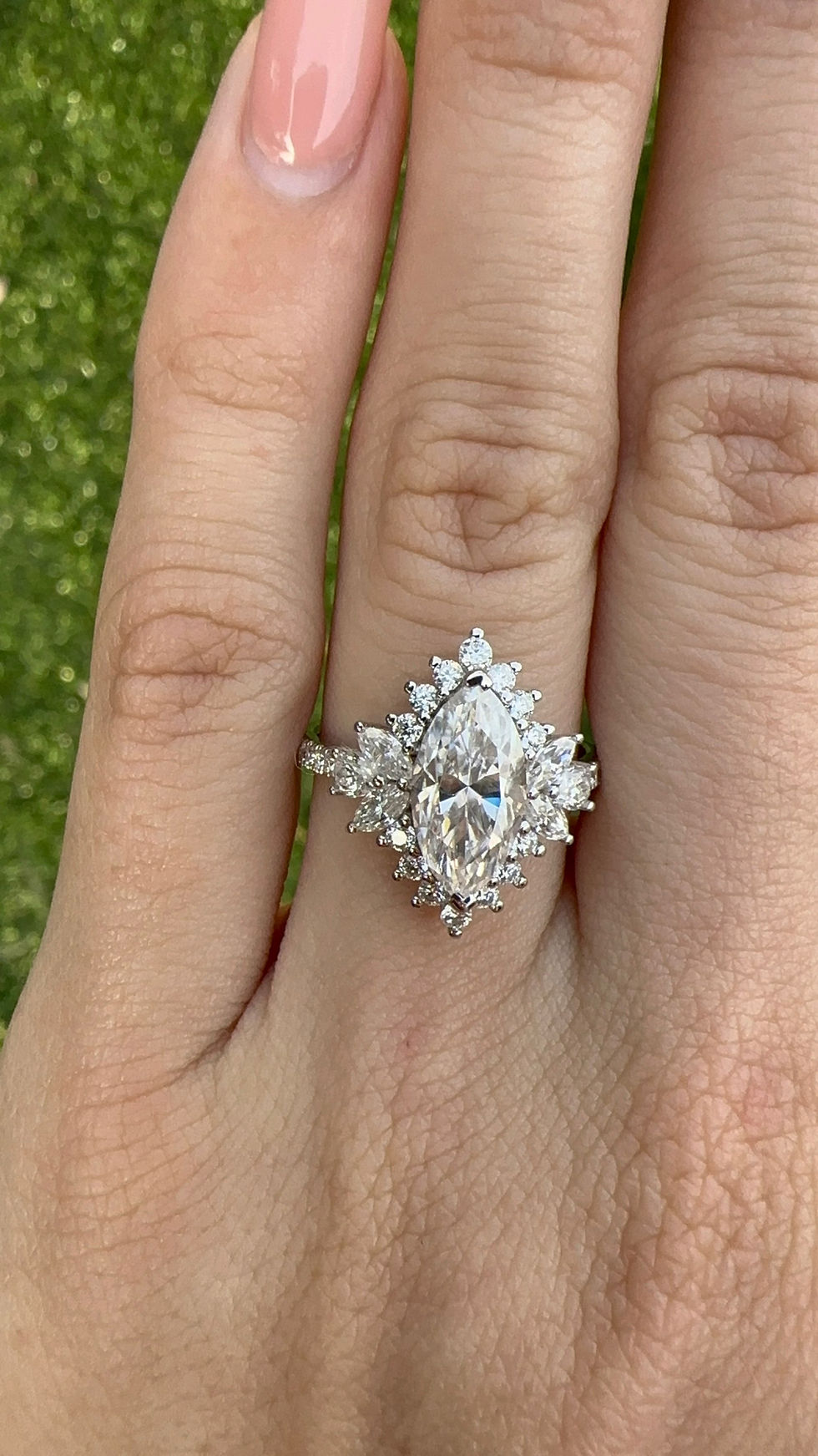 Thumbnail: 2 carat marquise with marquise accent stones and round halo 