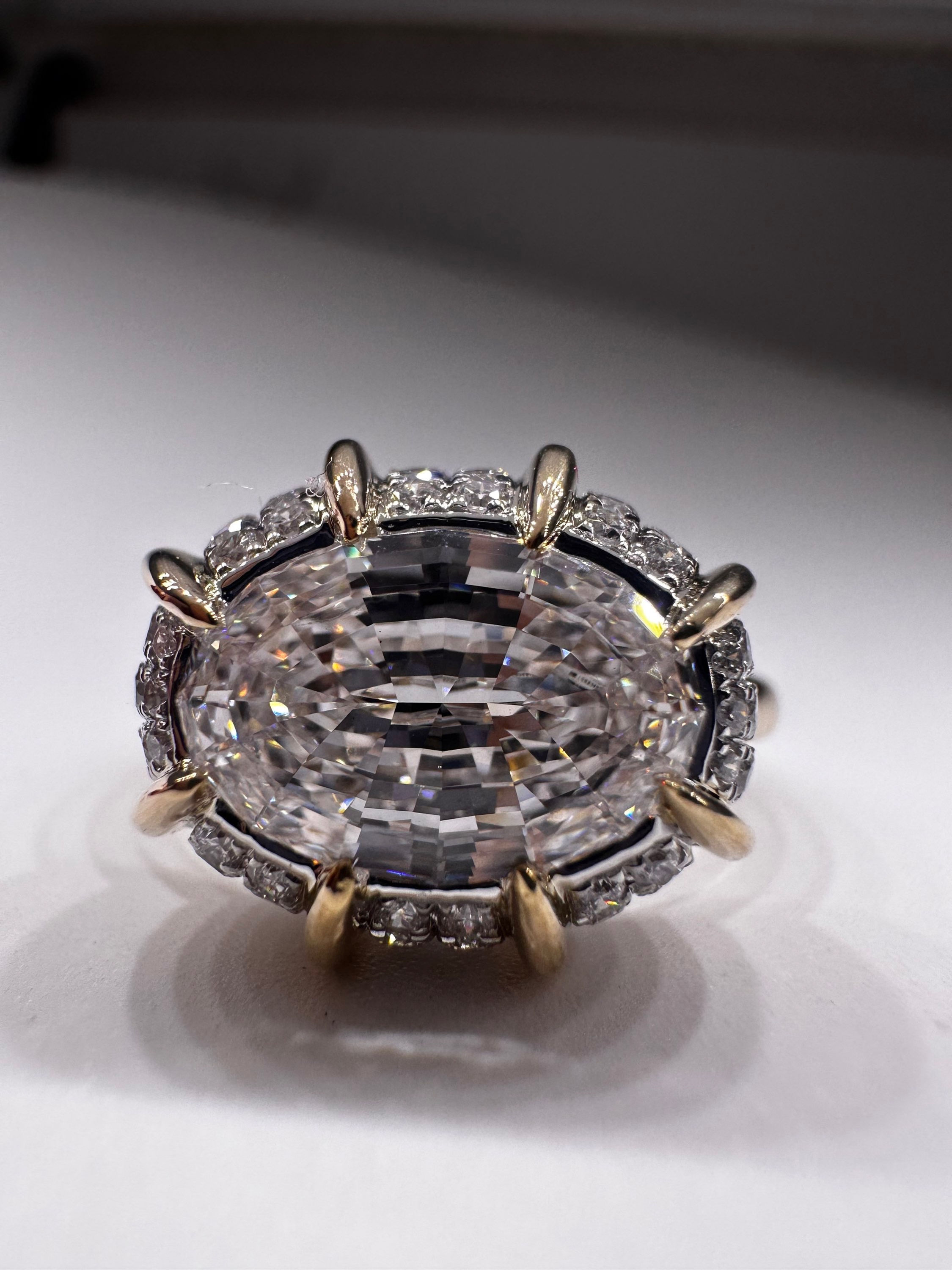 2.02 carat e vs1 step cut oval bombé lab diamond ring