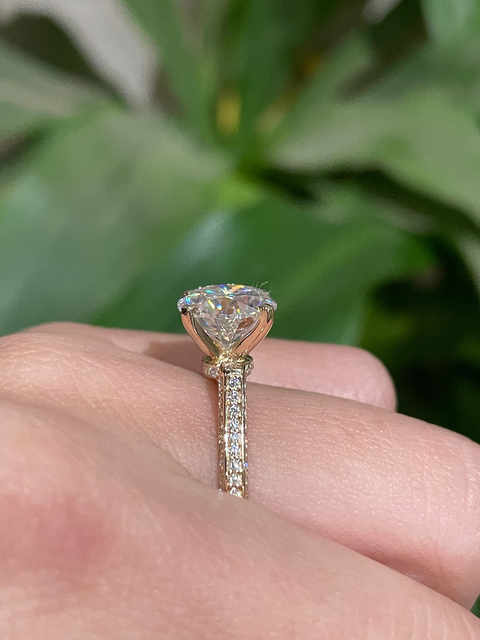 Thumbnail: 3 carat round floating with three sided pave band 