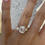 Thumbnail: 4 carat emerald cut 3 stone ring 