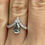 Thumbnail: 1 carat grey pear moissanite on chevron band 