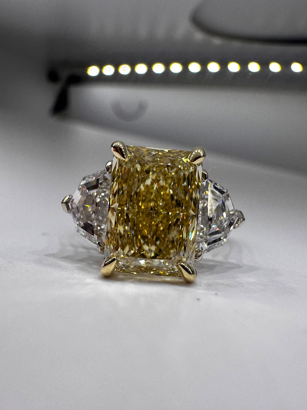 Thumbnail: 3.59 carat fancy intense yellow VVS2 radiant cut lab diamond with epaulette side