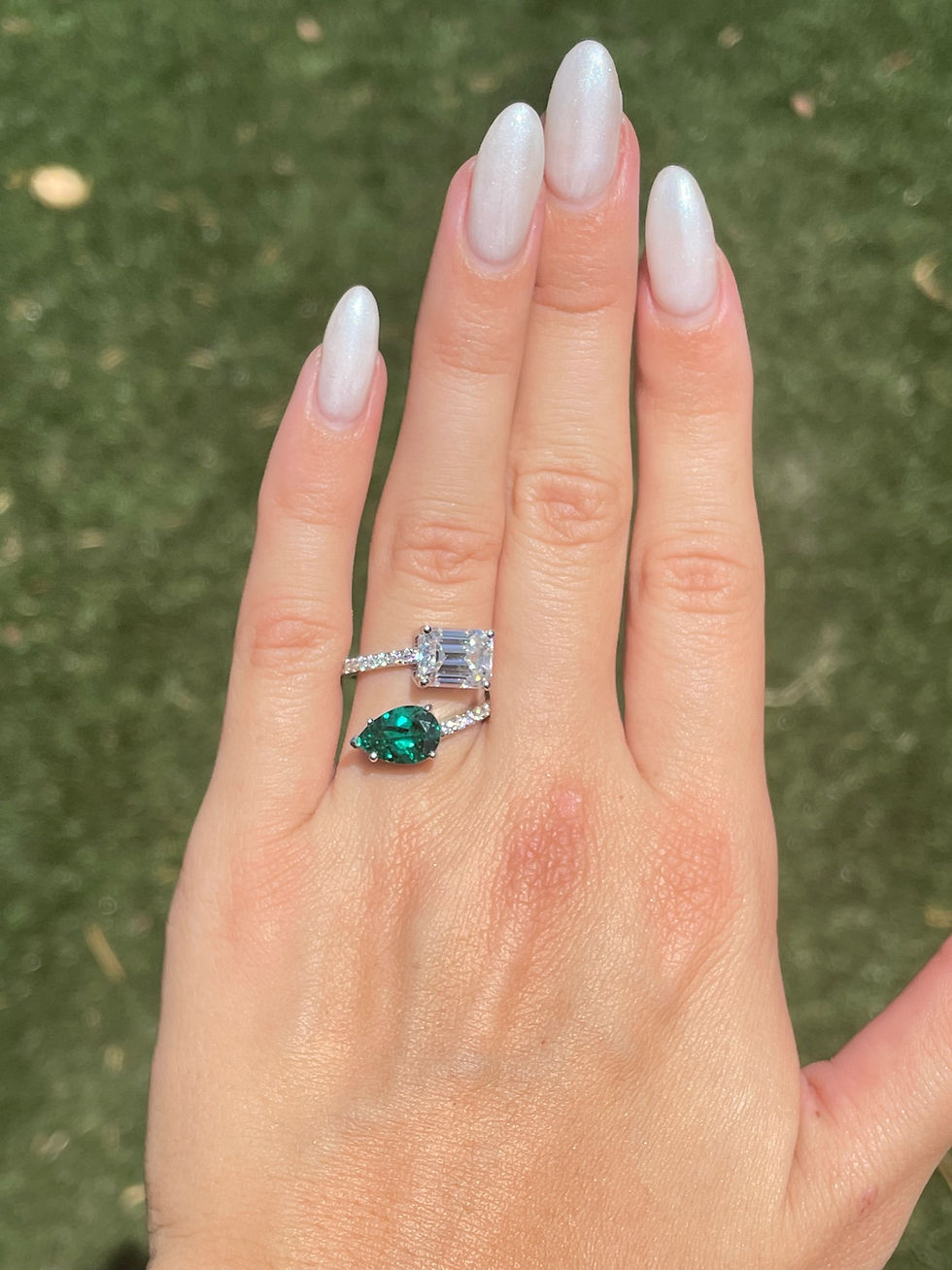 Thumbnail: Emerald cut moissanite and lab grown emerald toi et moi