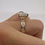 Thumbnail: 4.02 carat F VVS2 cushion lab diamond on a baguette band 