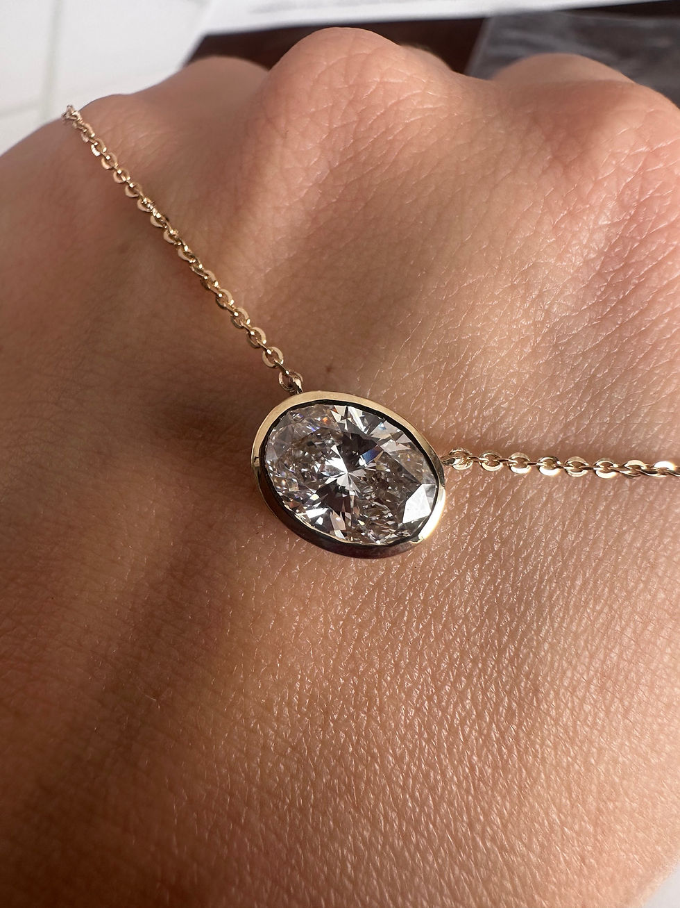 Thumbnail: 2.01 carat E VS1 east west oval bezel lab diamond necklace 
