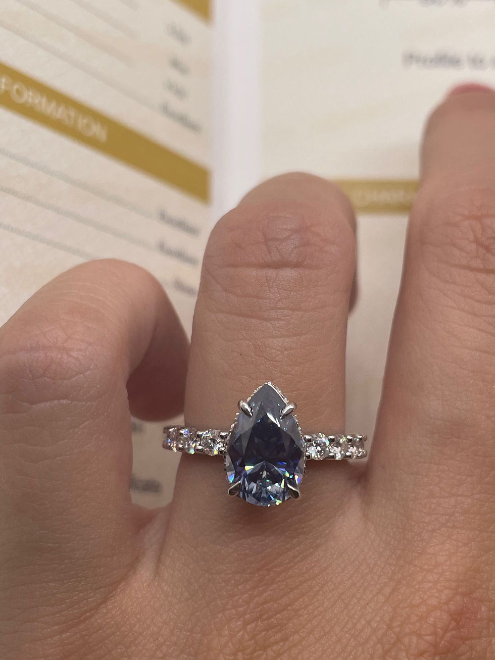 Thumbnail: 3 carat blue pear moissanite on a pavé band 14k white gold 