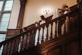 bride coming down staircase at rookery hall in nantwich