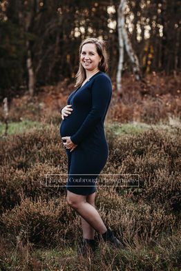 Pregnant mum in forest