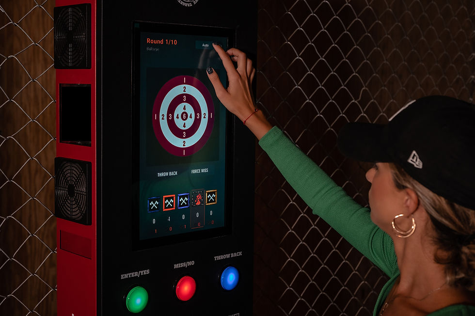 Person standing in front of a projector tower
