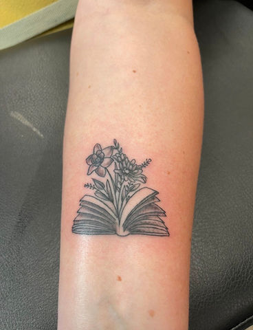 Black & grey tattoo, book tattoo, floral tattoo, minimalistic tattoo, fine line tattoo