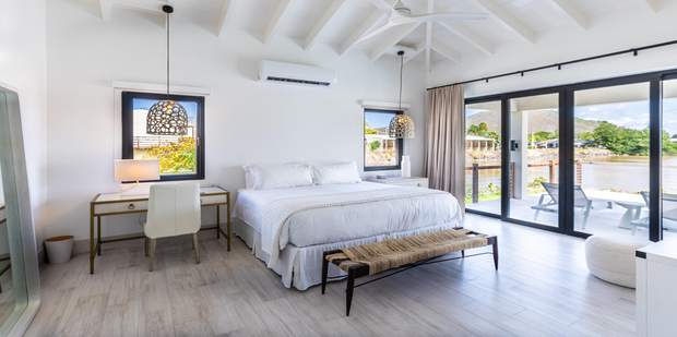 Modern bright bedroom with balcony in St. Kitts