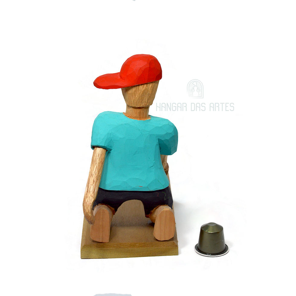 Miniatura: Boneco jogando Gude