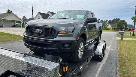 Strike First Towing light duty towing truck