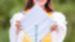 high school senior posing with graduation cap