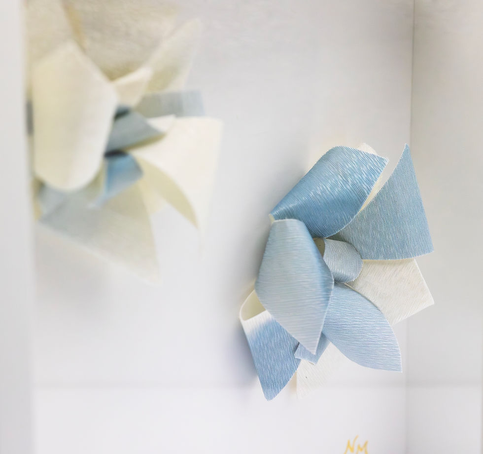 Sustainable floral wall sculpture, handcrafted eco-friendly decorative art by ArtEssence.
