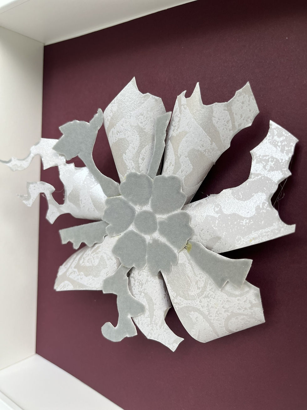 ArtEssence contemporary wall art – 3D floral sculpture with silver and white petals. Elegant handcrafted décor for offices