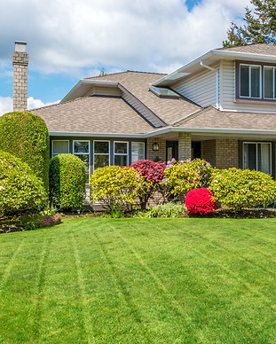 Luxury house with freshly mown grass law