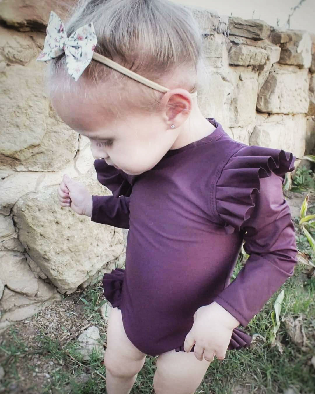 Plum long-sleeved swimsuit (size 1-2 yrs) 