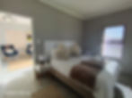 Modern bedroom weekend getaway accommodation with plush bed