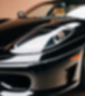 close up on hood of a black ferrari 360_edited.jpg