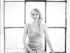 Angela Hicks smiling by the window