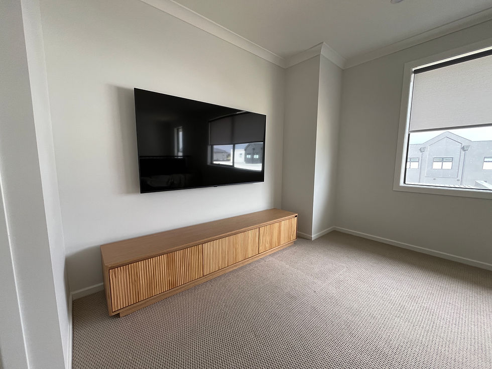 Eye-level view of a wall-mounted TV with stylish hidden cables