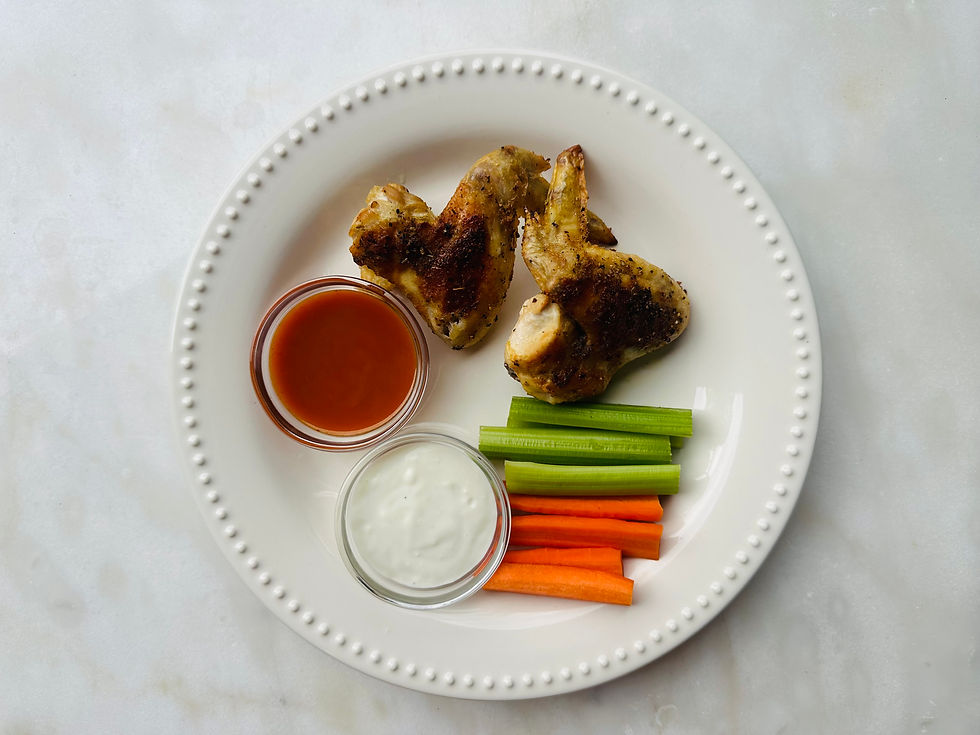Crispy Baked Buffalo Wings with Bolthouse Bleu Cheese Dressing and Primal Kitchen Buffalo Sauce