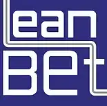 Il logo di Leanbet rappresenta l'eccellenza nella consulenza Lean Thinking e nell'applicazione del metodo Kaizen. Attraverso l'ottimizzazione processi e una mirata formazione aziendale, Leanbet supporta le imprese nel raggiungimento dell'efficienza operativa e nella riduzione sprechi. Un’identità visiva che riflette l’impegno costante nel migliorare la produttività industriale e gestionale, offrendo soluzioni strategiche per una crescita sostenibile e competitiva sul mercato.