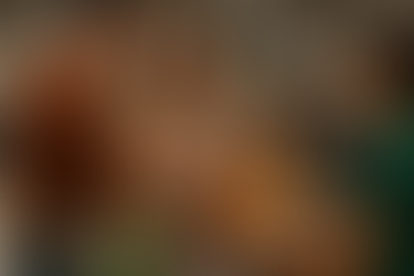 A man pays it forward by paying the groceries of the family being him.