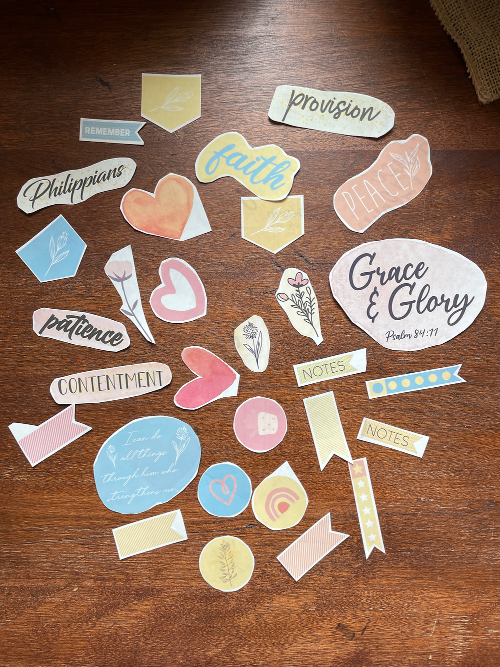 Cutting out stickers for #biblequiltjournal page