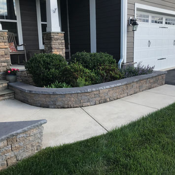 Stamped Concrete Walls by Greystone Masonry