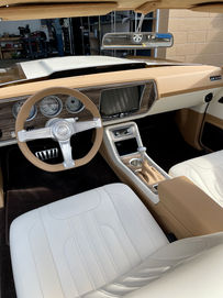 1970 Chevy El Camino custom cockpit interior with CAD-modeled dash, leather-wrapped console, and white bucket seats