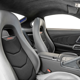 Custom Toyota Supra interior with re-engineered panels and Alcantara finish.