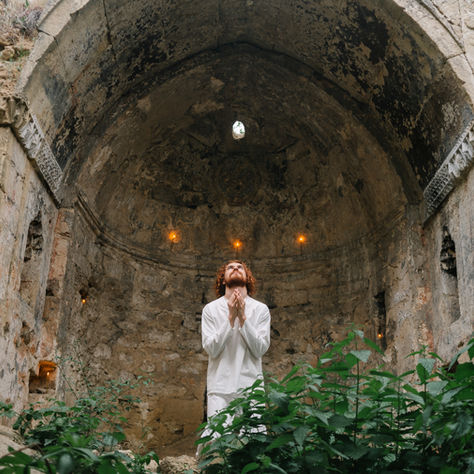man praying ancestral 