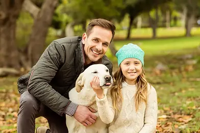 young-family-with-dog_1000.webp