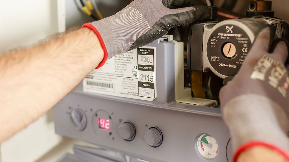 Jolt HVAC technician repairing a furnace in Litchfield NH
