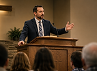 Pastor at pulpit.png