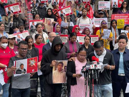 Family of Win Rozario speak at rally it City Hall, NYC.