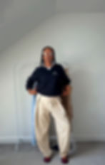 A Beautiful women Styling Adidas Samba Jane with Tailored Trousers